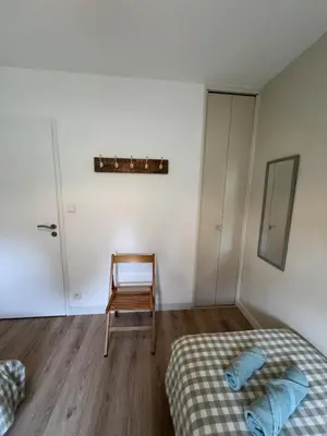 Un ou plusieurs lits dans un hébergement de l'établissement L'esprit vacances-T3 à Port La Forêt