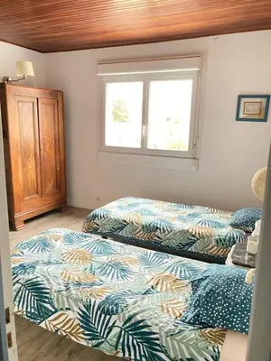 Un ou plusieurs lits dans un hébergement de l'établissement Maison spacieuse Lesconil, au calme 700 m des plages