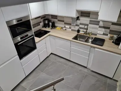 Cuisine ou kitchenette dans l'établissement Guerlesquin village house