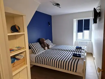 Un ou plusieurs lits dans un hébergement de l'établissement Guerlesquin village house