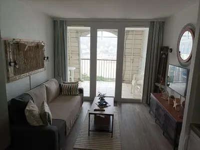 Télévision ou salle de divertissement dans l'établissement Nouveau appartement cosy vue mer
