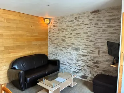 Coin salon dans l'établissement Charmant gîte entre terre et mer