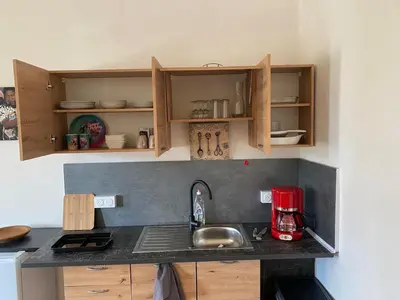 Cuisine ou kitchenette dans l'établissement Fredonia-MacBed