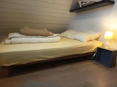 Un ou plusieurs lits dans un hébergement de l'établissement Maison en bordure des dunes de Sainte Marguerite