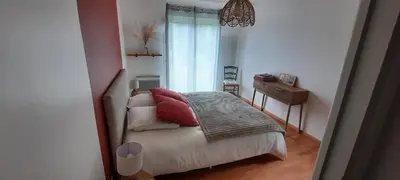 Un ou plusieurs lits dans un hébergement de l'établissement Maison aux portes de la ville