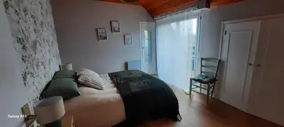 Coin salon dans l'établissement Maison aux portes de la ville