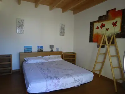 Un ou plusieurs lits dans un hébergement de l'établissement Maison proche de la mer