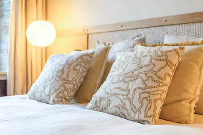 Un ou plusieurs lits dans un hébergement de l'établissement La Maison Brevan