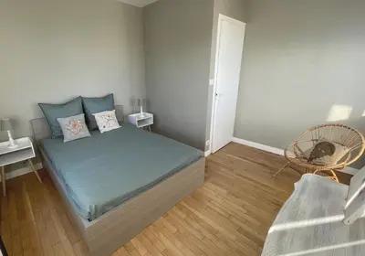 Un ou plusieurs lits dans un hébergement de l'établissement Nouveau Maison quartier calme- jardin