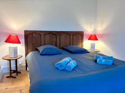 Un ou plusieurs lits dans un hébergement de l'établissement Ker aphicahel - Maison typique de charme carantec