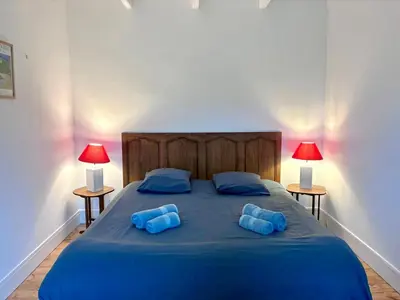 Un ou plusieurs lits dans un hébergement de l'établissement Ker aphicahel - Maison typique de charme carantec