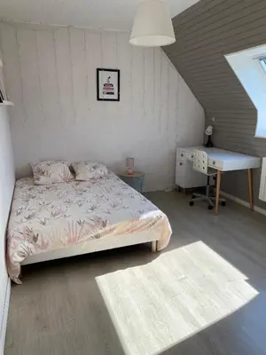 Un ou plusieurs lits dans un hébergement de l'établissement Maison cosy à Guipavas 3 chb, proche Brest et aéroport