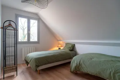 Un ou plusieurs lits dans un hébergement de l'établissement Ty Yseult - Maison Bretonne avec Jardin