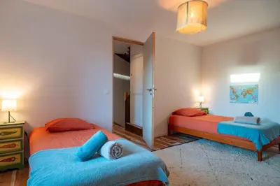 Un ou plusieurs lits dans un hébergement de l'établissement Chez Alice et Antoine - 300 m de la plage