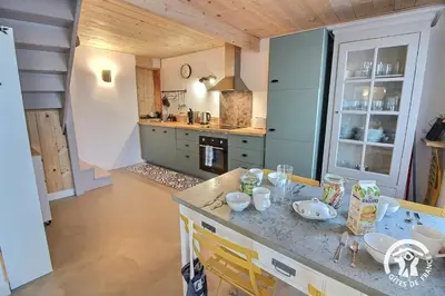 Cuisine ou kitchenette dans l'établissement Les pieds dans l'eau