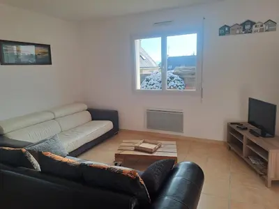 Coin salon dans l'établissement Maison familiale à deux pas des plages et du port