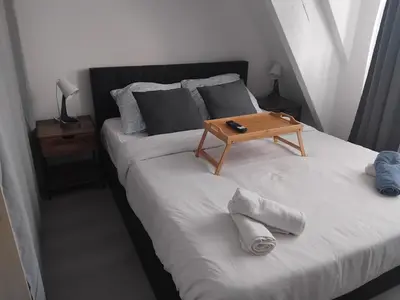 Un ou plusieurs lits dans un hébergement de l'établissement Appartement BREST 2 chambres