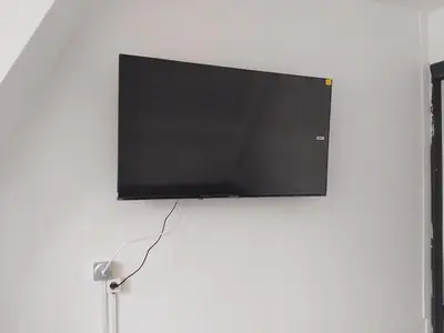 Télévision ou salle de divertissement dans l'établissement Appartement BREST 2 chambres