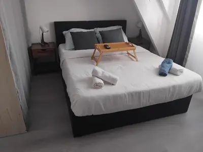 Un ou plusieurs lits dans un hébergement de l'établissement Appartement BREST 2 chambres