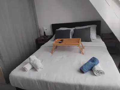 Un ou plusieurs lits dans un hébergement de l'établissement Appartement BREST 2 chambres