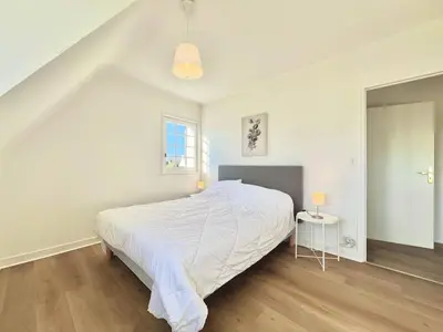 Un ou plusieurs lits dans un hébergement de l'établissement Maison familiale à Beg Meil, plage à 5 min à pied