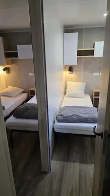 Un ou plusieurs lits dans un hébergement de l'établissement Mobile home 4 a 6 personnes Domaine de Kerlann
