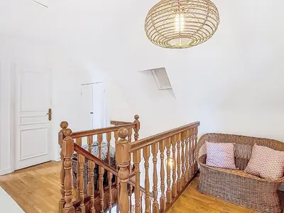 Un ou plusieurs lits dans un hébergement de l'établissement Holiday Home Le Clozic by Interhome