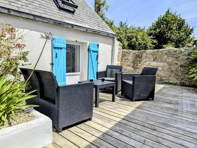 Coin salon dans l'établissement Gite Ker Domi 3 personnes-Plages et GR34 à pied Plouguerneau