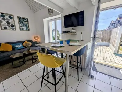 Coin salon dans l'établissement Gite Ker Domi 3 personnes-Plages et GR34 à pied Plouguerneau