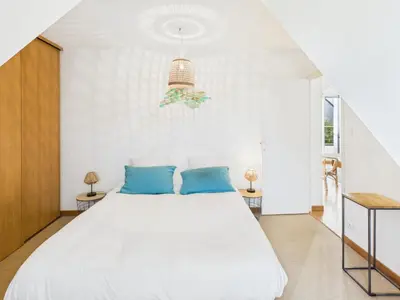 Un ou plusieurs lits dans un hébergement de l'établissement -ODILE- Grande maison a Cap Coz proche plage