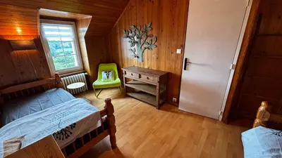 Un ou plusieurs lits dans un hébergement de l'établissement Maison Ar Vro 12 au cœur de la Bretagne