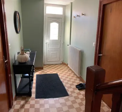 Coin salon dans l'établissement Les Chambres de la Chapelle