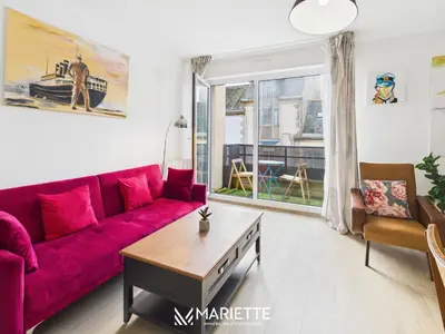 Coin salon dans l'établissement -PEARL- Duplex avec balcon en bord de mer