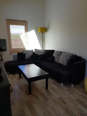 Coin salon dans l'établissement la maison de la plage