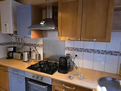 Cuisine ou kitchenette dans l'établissement Bright apartment in downtown Brest