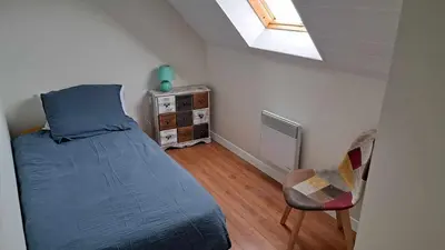 Un ou plusieurs lits dans un hébergement de l'établissement Maison plein bourg pays bigouden