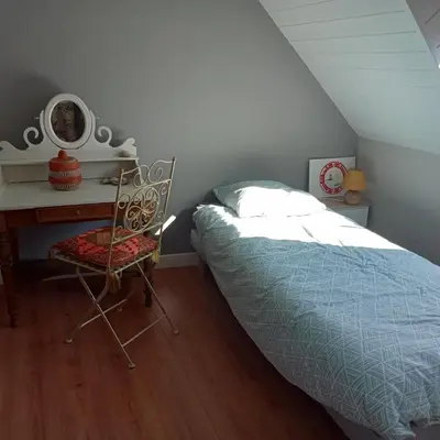 Un ou plusieurs lits dans un hébergement de l'établissement Maison plein bourg pays bigouden