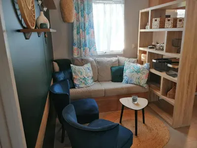 Coin salon dans l'établissement Charmant mobil-home Pont-Aven