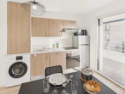 Cuisine ou kitchenette dans l'établissement Plein centre ville - Appart pour 2 avec balcon