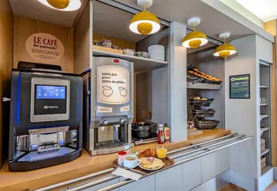 Cuisine ou kitchenette dans l'établissement B&B HOTEL Brest Kergaradec Aéroport