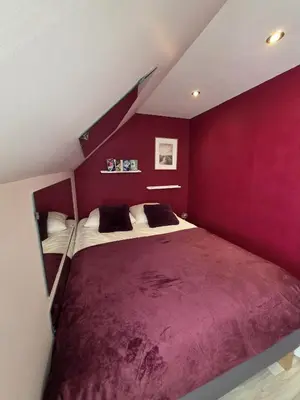 Un ou plusieurs lits dans un hébergement de l'établissement charmante maison vue mer proche plage