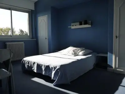 Un ou plusieurs lits dans un hébergement de l'établissement Maison Ville - Plage - Concarneau