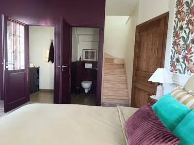 Un ou plusieurs lits dans un hébergement de l'établissement Les chambres du Lohan