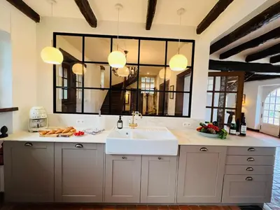 Cuisine ou kitchenette dans l'établissement Holiday Home Villa Monrepos by Interhome