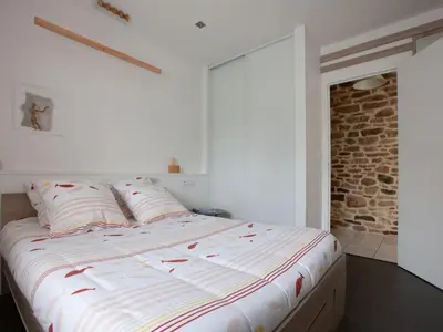 Un ou plusieurs lits dans un hébergement de l'établissement Holiday Home Großes Haus mit überdachtem und beheiztem Swimmingpool by Interhome