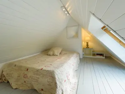 Un ou plusieurs lits dans un hébergement de l'établissement Holiday Home Großes Haus mit überdachtem und beheiztem Swimmingpool by Interhome