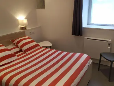 Un ou plusieurs lits dans un hébergement de l'établissement Holiday Home Großes Haus mit überdachtem und beheiztem Swimmingpool by Interhome
