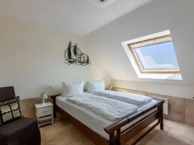 Un ou plusieurs lits dans un hébergement de l'établissement Holiday Home Villa DUXCAAR by Interhome