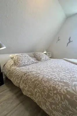 Un ou plusieurs lits dans un hébergement de l'établissement Holiday Home VILLA Kergoz by Interhome