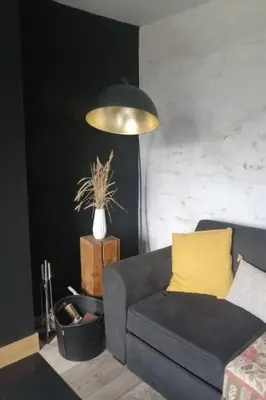 Coin salon dans l'établissement Holiday Home Bretagne Loctudy Haus Les Camélias 3 Personen by Interhome